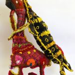 Trudy-Inkamala_Woman-with-Goanna_Cat77-18_woollen-blanket-knitting-wool-cotton-metal-stand_46x32x9cm